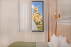 Postel nebo postele na pokoji v ubytování Iris Hotel
