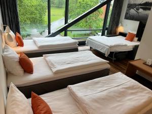 Postel nebo postele na pokoji v ubytování Vingsted Hotel & Konferencecenter