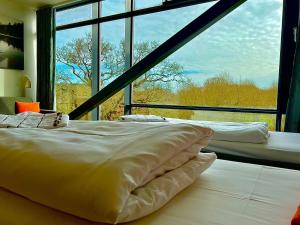 Postel nebo postele na pokoji v ubytování Vingsted Hotel & Konferencecenter