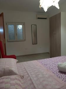 Posteľ alebo postele v izbe v ubytovaní B&B da Giovanna Dimora del Turista