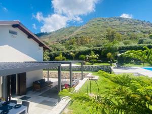 a house with a view of a mountain at flAle's holiday house in Cefalù