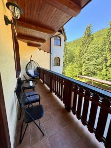 A balcony or terrace at Apartment Amelia Tale, View of Chopok from large terrace, In the nature