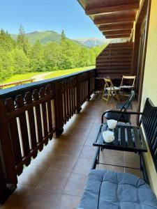 A balcony or terrace at Apartment Amelia Tale, View of Chopok from large terrace, In the nature