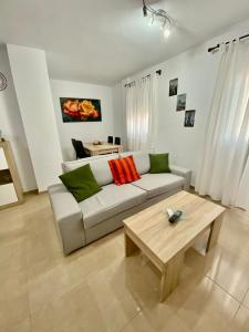 Posezení v ubytování “SMILE NERJA” chic apartment with WIFI, 4 guests