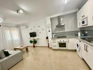 Kuchyň nebo kuchyňský kout v ubytování “SMILE NERJA” chic apartment with WIFI, 4 guests