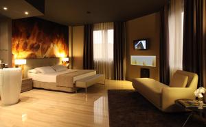 מיטה או מיטות בחדר ב-Hotel SB Ciutat Tarragona