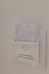 a white box with a plastic wrapper on top of it at Vila Melisa in Ksamil