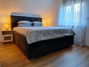 Posteľ alebo postele v izbe v ubytovaní Apartments Poljanak