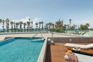 A piscina localizada em The GrandResort - Limited Edition by Leonardo Hotels ou nos arredores