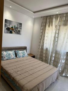 Postel nebo postele na pokoji v ubytování Nouveau appartement