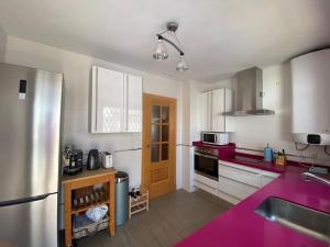 Køkken eller tekøkken på Casa Playa la Jara