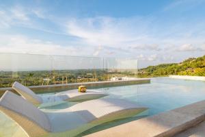 Bazén v ubytování Villa Friendly - Luxury 4 BR villa In Uluwatu nebo v jeho okolí