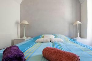 Posteľ alebo postele v izbe v ubytovaní La Maison de B