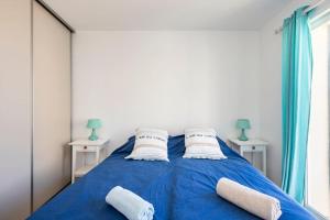 Posteľ alebo postele v izbe v ubytovaní La Maison de B