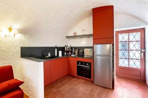Kuchyňa alebo kuchynka v ubytovaní La Maison de B