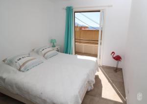 Posteľ alebo postele v izbe v ubytovaní La Maison de B