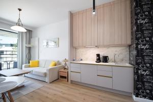 Кухня или кухненски бокс в RentPlanet - Apartamenty Shellter