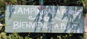 a sign with graffiti on the side of it at Scout-2 in Le Fay