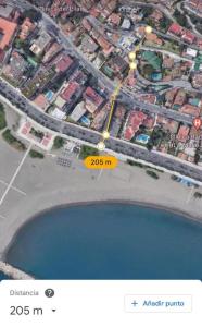 eine Karte einer Stadt mit einer Straße und einem See in der Unterkunft Villa María Teresa in Málaga