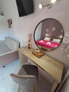 TV a/nebo společenská místnost v ubytování Ilias Apartments