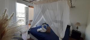 Voodi või voodid majutusasutuse Cap Saint Martin Marina toas