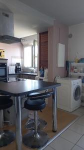 Kuchyň nebo kuchyňský kout v ubytování Myriadel chambre double B&B