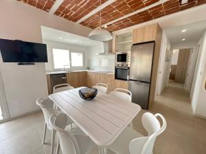 Kuchyň nebo kuchyňský kout v ubytování Agi Arago Apartments + 21 fotografií