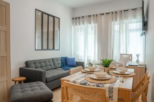 Un lugar para sentarse en Lavie Maison AC and Balneo