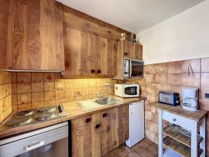 Virtuvė arba virtuvėlė apgyvendinimo įstaigoje Appartement Combloux, 2 pièces, 6 personnes - FR-1-560-51