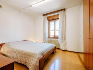 Postel nebo postele na pokoji v ubytování Apartment Fruet by Interhome