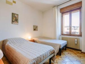 Postel nebo postele na pokoji v ubytování Apartment Fruet by Interhome