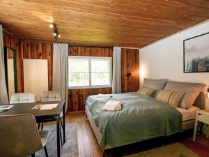 Voodi või voodid majutusasutuse Holiday Home s`Hüttl reloaded by Interhome toas