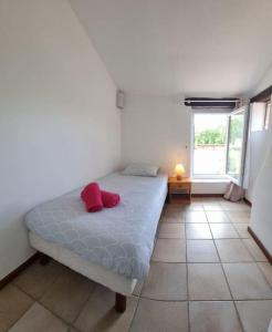 Postel nebo postele na pokoji v ubytování Maison dans un endroit paisible