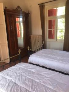 Postel nebo postele na pokoji v ubytování Villa Enoteca - Wine Experiences