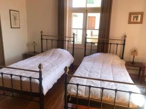 Postel nebo postele na pokoji v ubytování Villa Enoteca - Wine Experiences