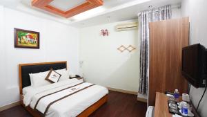 Voodi või voodid majutusasutuse Phuong Dong hotel toas