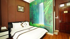 Voodi või voodid majutusasutuse Phuong Dong hotel toas