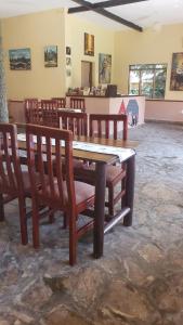 Posezení v ubytování Secrets Guest House Entebbe