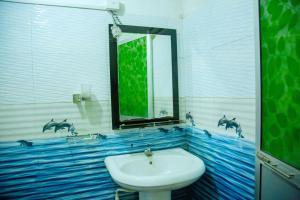 Ванная комната в Sri Shahrukh Lake Resort