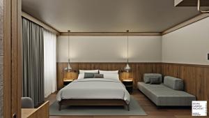 Postel nebo postele na pokoji v ubytování Hotel Serena Cortina