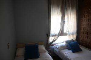 Postel nebo postele na pokoji v ubytování De Felipe Casa Rural