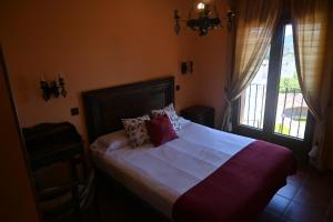 Postel nebo postele na pokoji v ubytování De Felipe Casa Rural