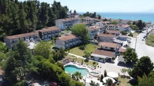 an aerial view of a resort with a swimming pool at Jenny Hotel in Siviri
