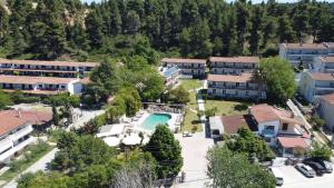 an aerial view of a resort with a swimming pool at Jenny Hotel in Siviri