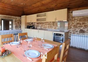 Η κουζίνα ή μικρή κουζίνα στο MyStay - Casa do Alpendre