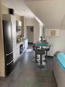 Kuchyň nebo kuchyňský kout v ubytování Agréable appartement t2 à St leu