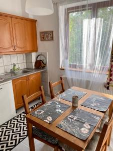 Kuchyň nebo kuchyňský kout v ubytování LaBONI Apartman