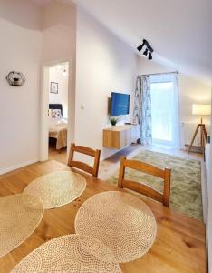 Televízia a/alebo spoločenská miestnosť v ubytovaní LAGUNA Apartament Polanica Residence 54