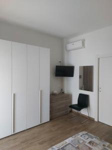 TV a/nebo společenská místnost v ubytování B&B Un posto al Sole