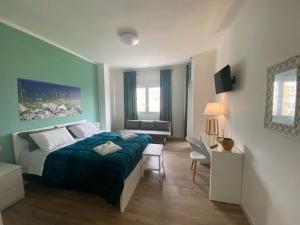 Postel nebo postele na pokoji v ubytování B&B Campus Suites Bari